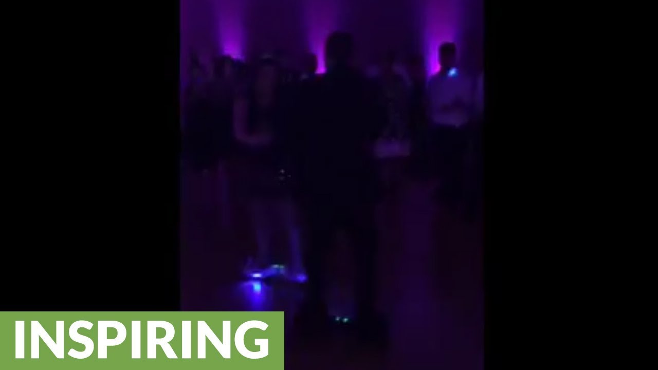 Newlyweds surprise guests with high-tech wedding dance