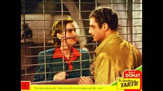 The Adventures of Tartu 1943.  Donat superb in this romance thriller war drama.  Full movie.