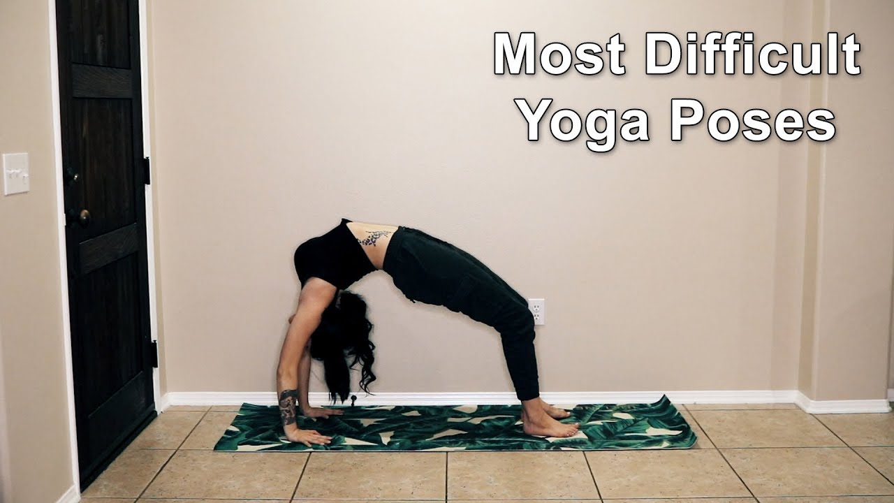 Side view of young female performing difficult yoga pose while sitting on  stretching mat in living room Stock Photo | Adobe Stock