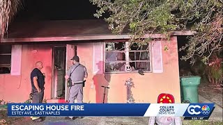 Neighbor rescues woman trapped in East Naples duplex fire with screwed-shut windows