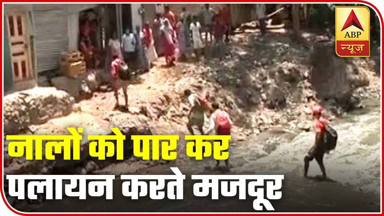 Mumbai: Migrant Labourers Cross Dirty Canals In A Bid To Return Home ...