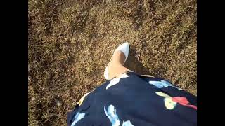 Man walks outside in Flower Pattern Skirt Pantyhose white Pumps