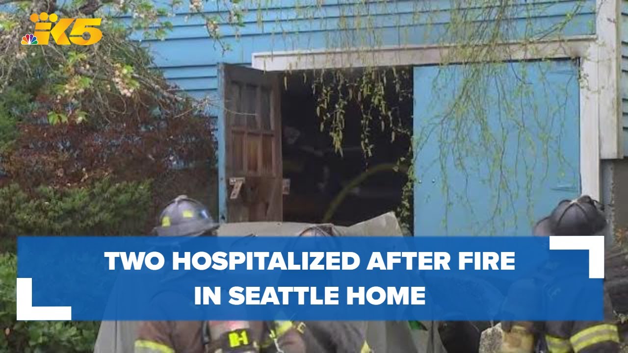 Two people hospitalized after fire at Seattle home - YouTube