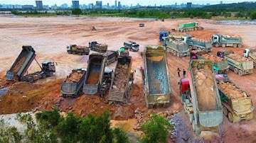 amazing Super 130 Truck Moving Dirt For Lake Reclamation Huge Land Filling Up Project In The Lake