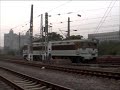 The Chinese railway Electric and Diesel locomotive SS3 6056 + DF4B 9217 at BeiJing Depot