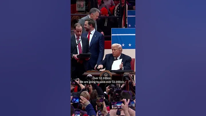 Trump signs executive actions onstage during inauguration