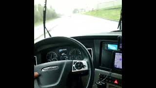 POV Inside of a fully loaded Big Rig Semi Truck 18 Wheeler racing down an old country road. (3)