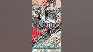 Excavator Pouring Concrete into Foundation Formwork- Satisfying jobs and machinery in the world