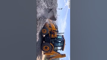 jcb 3dx machine loading Stone for railway work