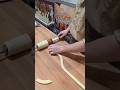 Rolling up and cooking the Kurtos Kalacs sweets from Hungary and Romania