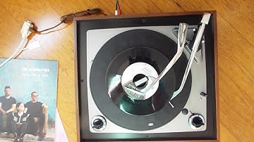 VM 1235 automatic 4 speed, STEREO record changer playing a couple 45