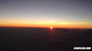 Sunrise from airplane cockpit