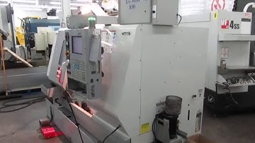 Haas SL-20T CNC Turning Center with Programmable Tailstock, Parts Catcher, Tool Presetter Chip Auger