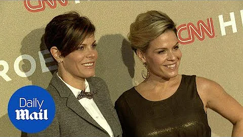 Cat Cora and wife Jennifer in happier times back i...