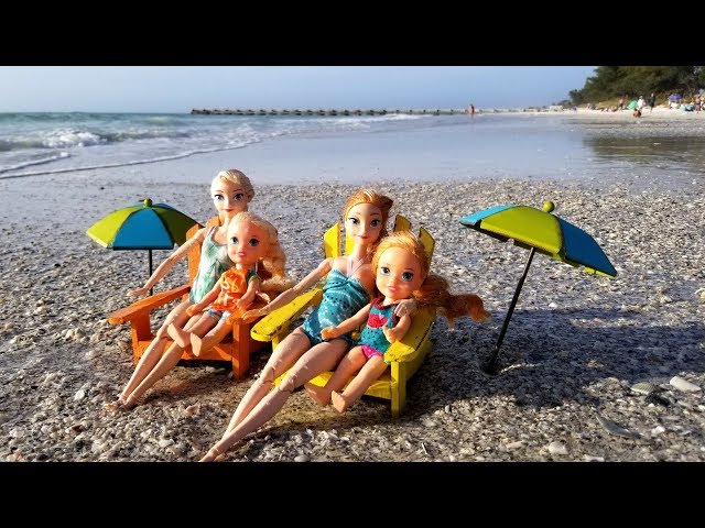 Elsa and Anna toddlers at the beach - prank - slide - boat - dog - water fun - splash class=