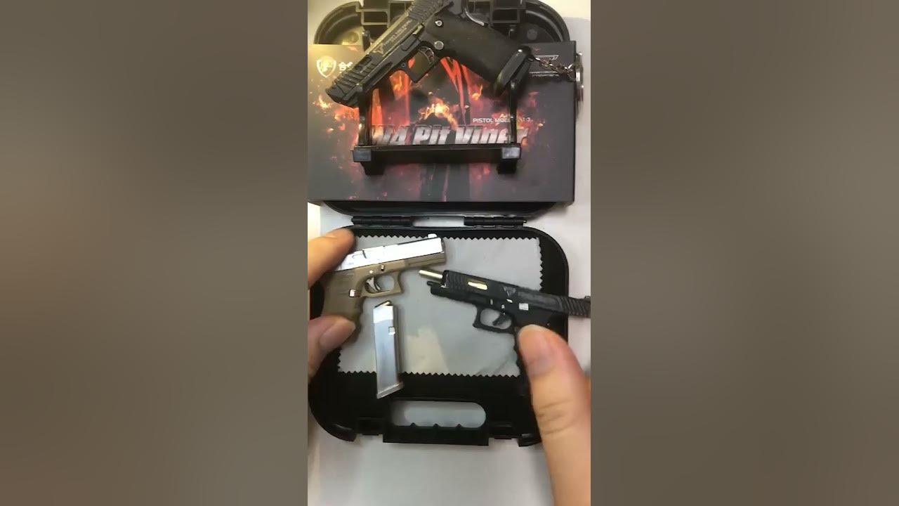 Who want this mini glock keychain with bullets?🤩ematok minigun 