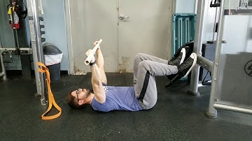 deadbug iso hold with dowel