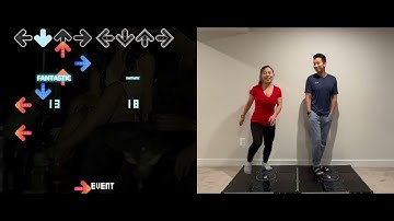 Teaching her how to DDR