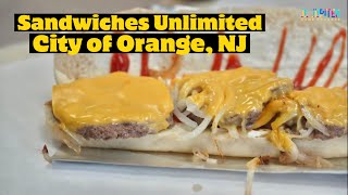 Italian Cheeseburger and the Hot Pastrami at Sandwiches Unlimited in the City of Orange, NJ