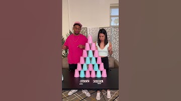 Couple adds humor to gender reveal with cup-stacking game! #shorts