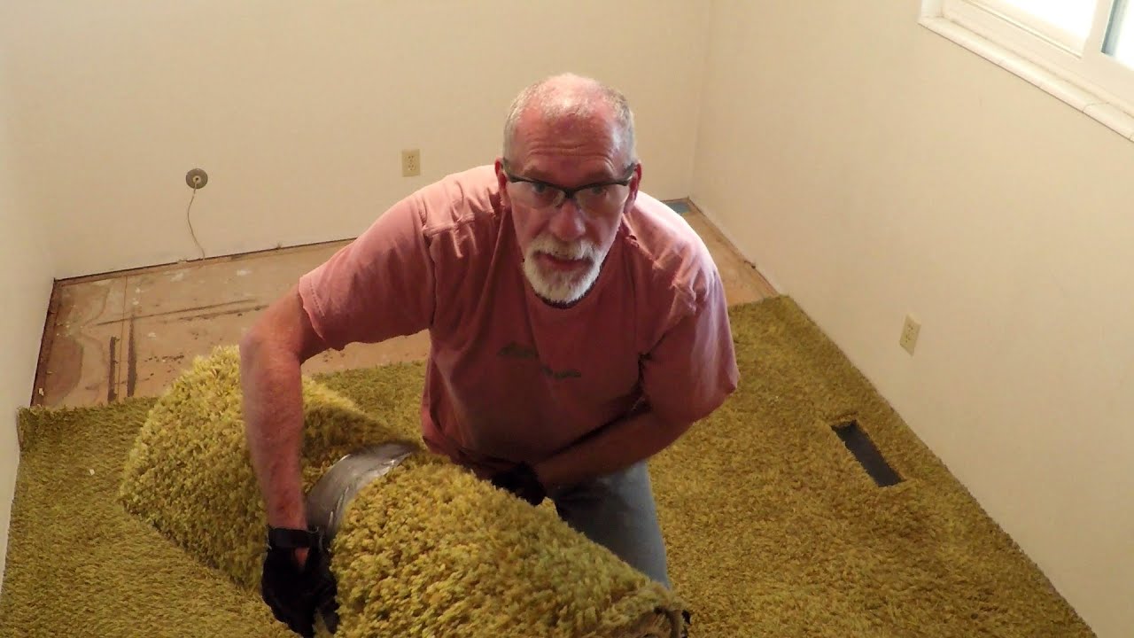 Tearing Out Old Carpet and Sneezing