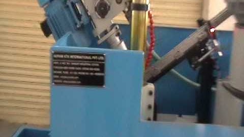 Multi spindle tapping machine with bowl feeder