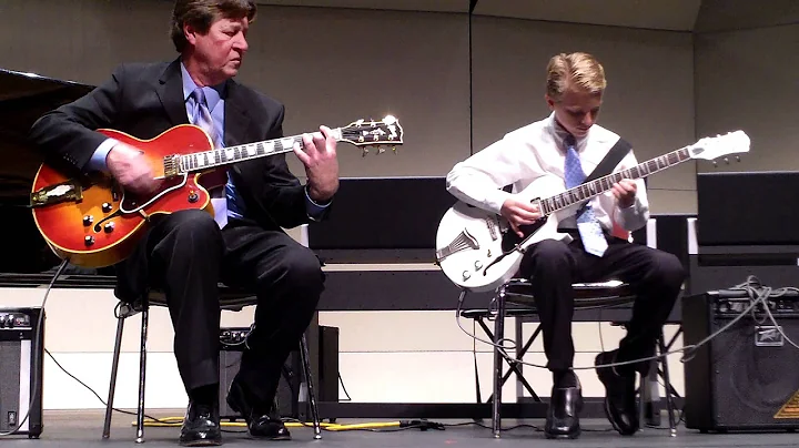 John Barry on guitar with Sandy Erickson playing C...
