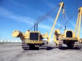 WORLDS BIGGEST SIDEBOOM CARRYING A CAT 594