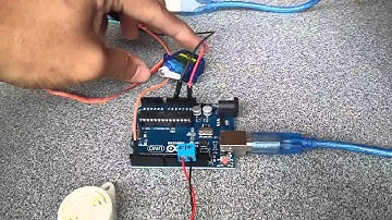 Alat pemberi makan ikan otomatis_Ahmad Faiz_1113091000082