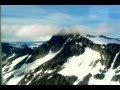 Glaciers Melting Away, baring the mountains; seen from the air - Southeast Alaska.