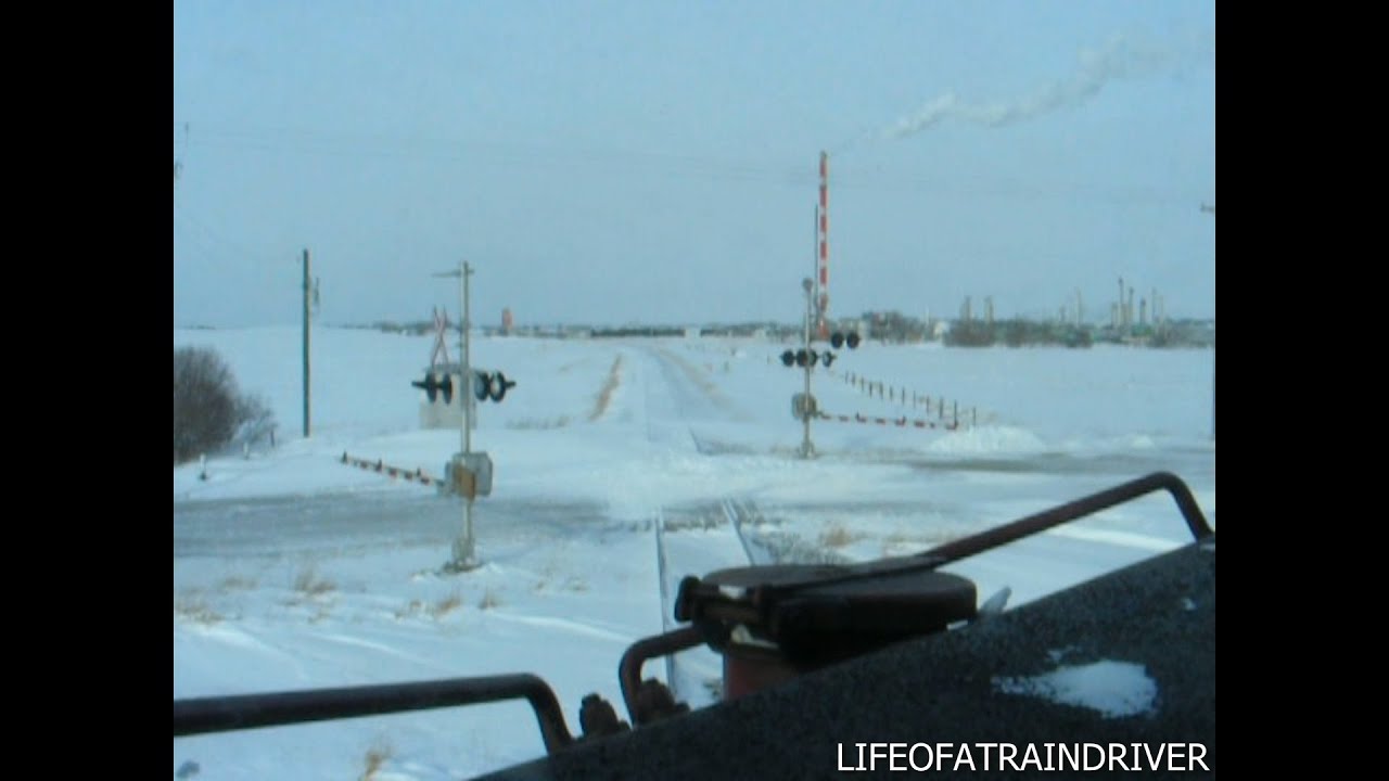 Locomotive Cab Ride Plowing Snow and Hitting Drifts on Red Deer Sub CP Rail