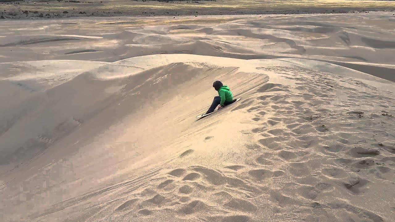 Sand sledding at Great Sand Dunes National Park YouTube