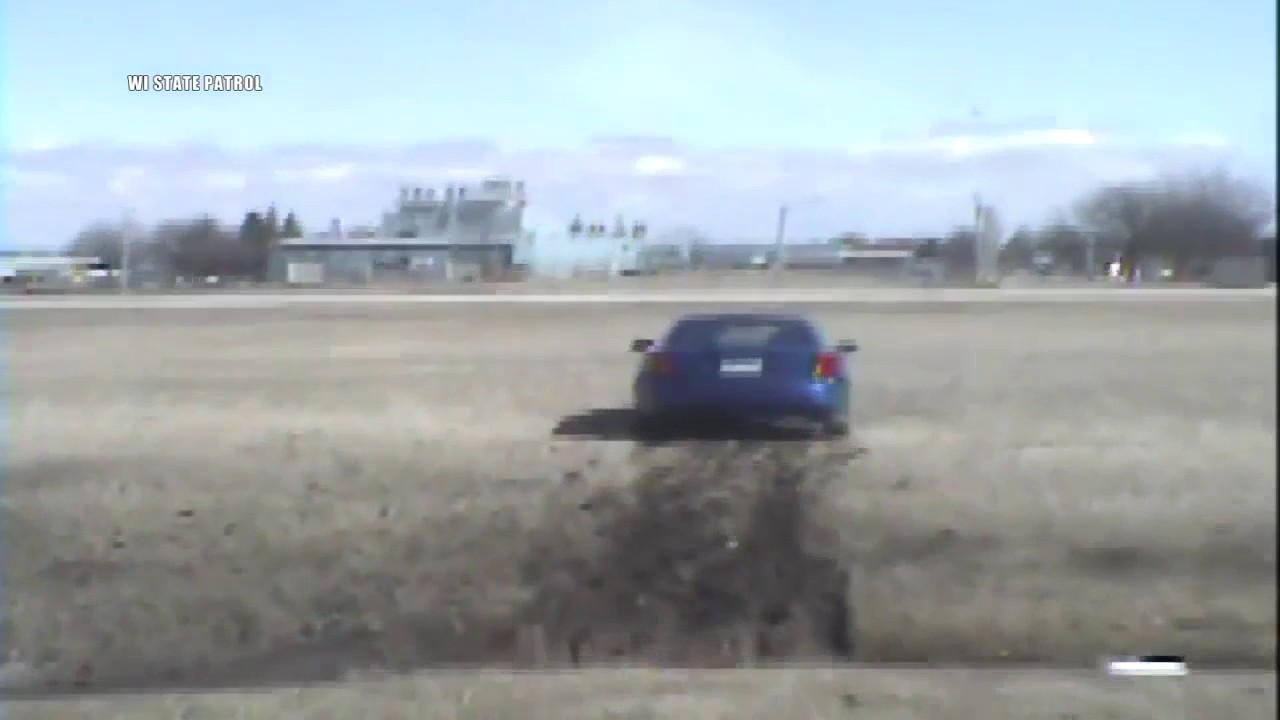 Driver leads police on chase through Oshkosh airport - YouTube