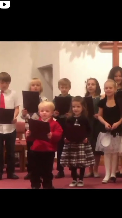 kid screams at singing thing (video isnt mine)