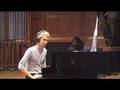 Matthew Bellamy playing "la campanella" by  on a grand piano