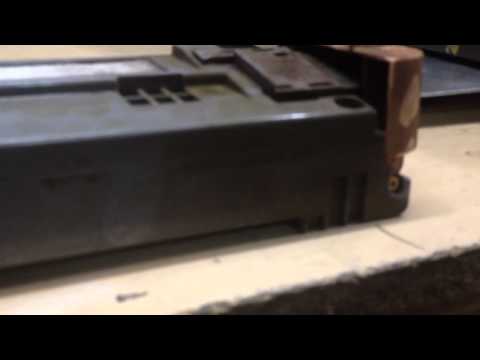 emptying-a-xerox-workcentre-7556-waste-toner-cartridge