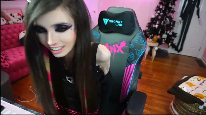 EUGENIA COONEY ADJUSTS HER CAMERA