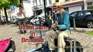 Busking in Brussels  completely improvised, with blues harp, guitar, looper, vocals