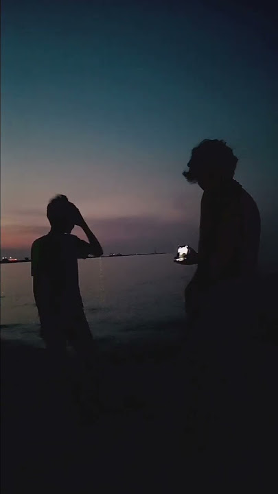 dua lelaki beraksi #fypyoutube #aksi #photoshoot #video #sunset sunset#pantai#batang