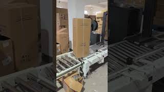 Case sealer with cross strapping machine #automation2026 #packagingline #packaging