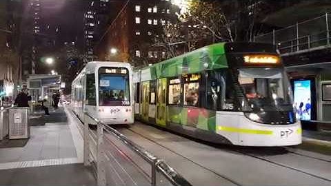 Ding! Ding! Night Trams in Collins St at William St Melbourne