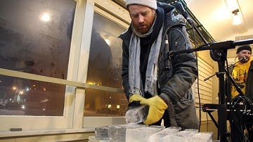 Band creating music with instruments made of ice