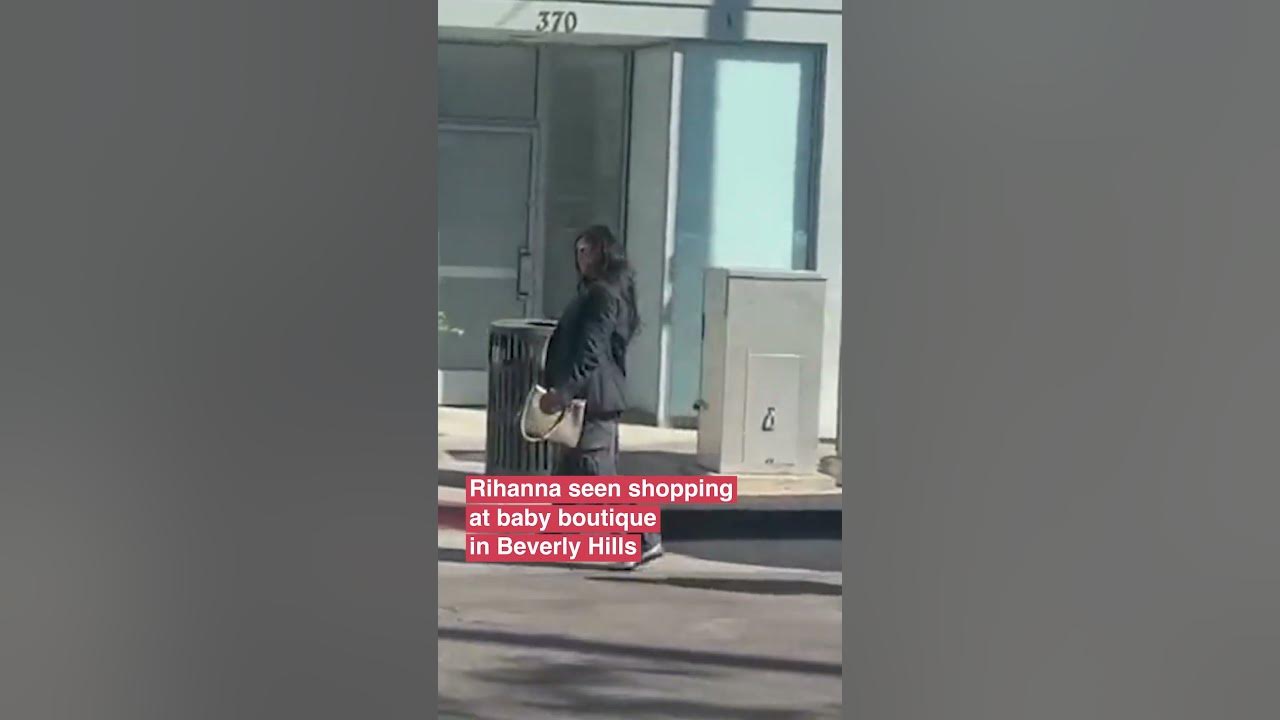 Rihanna showed off her growing baby bump as she enjoyed a day of shopping