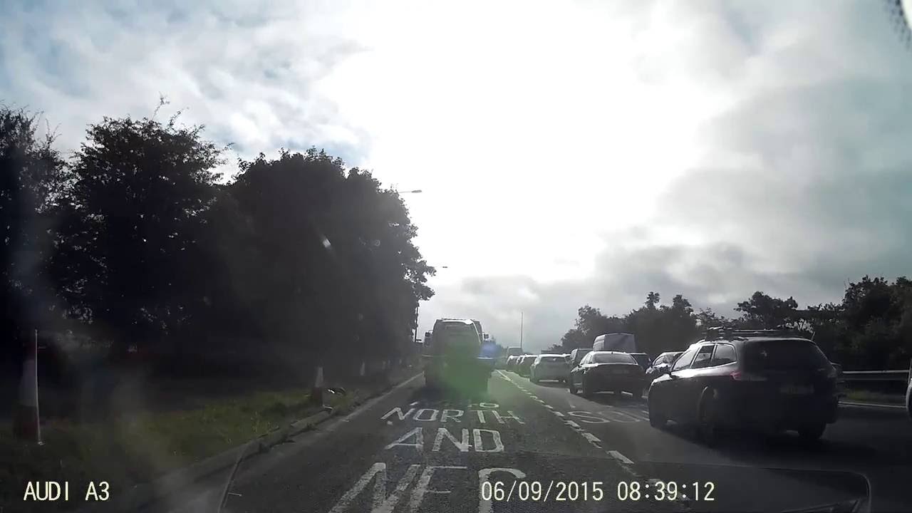 Cars illegally using hard shoulder to avoid queue