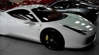 I filmed an amazing white 458 italia, with black rims. sorry for the
short video, but was in ferrari workshop, where isn't allowed make
photo and video...