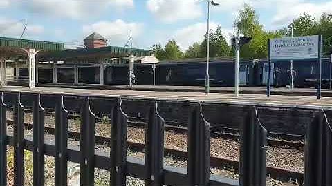 Transport for Wales Class 67 and 82 departing Llandudno Junction Station for Holyhead