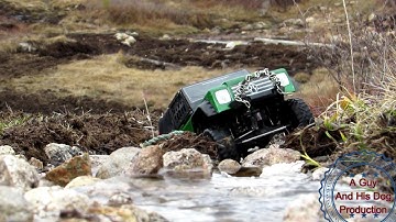Axial Racing Hatch-Back Dingo ...Transmission Line Creek Crawl