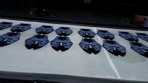 K3 Table Automatic Screen Printing Machine are printing footwear