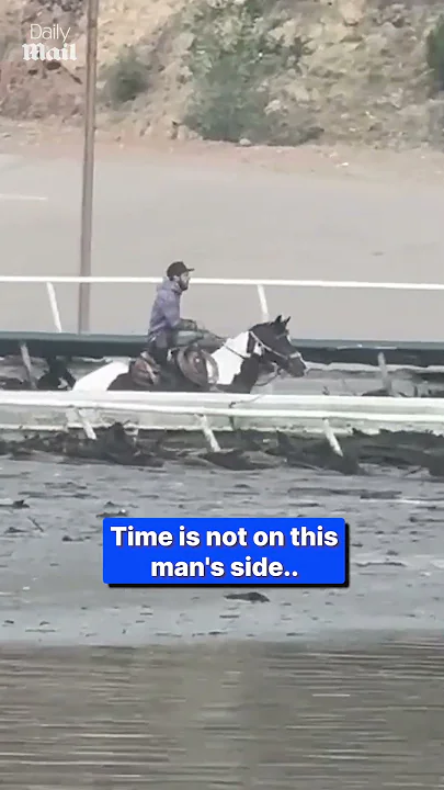 Hero on horseback rushes through floods!