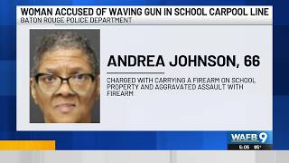 Woman accused of loading gun during school carpool fight arrested